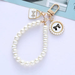 Pearl Charm Wristlet Keychain – Bow-Inspired Styles